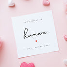 Valentine's Day card with 'To my favourite human' text on a pink background