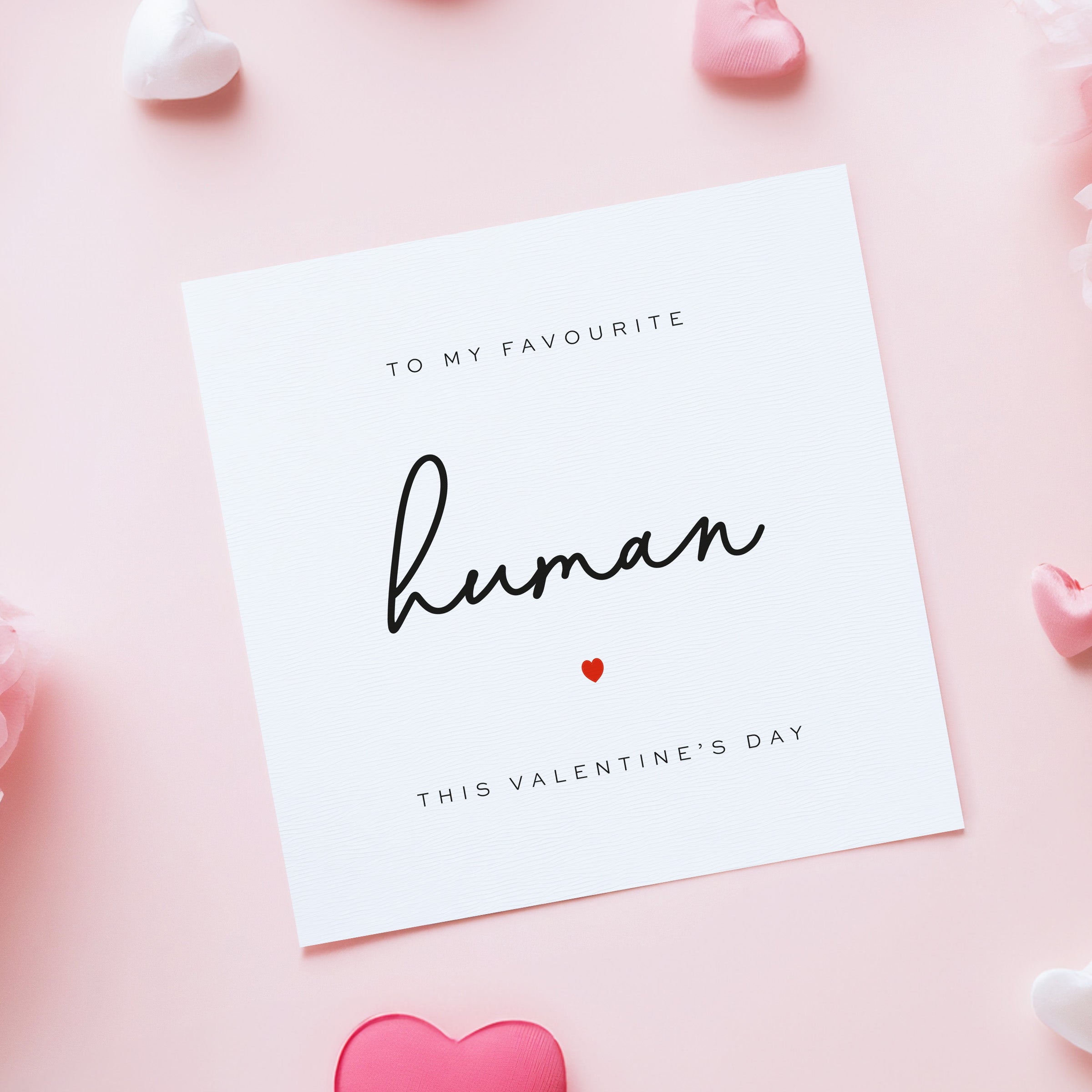 Valentine's Day card with 'To my favourite human' text on a pink background