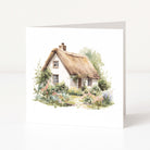 Greeting card with a watercolor illustration of a thatched cottage and garden on a white background