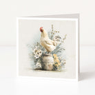 Greeting card with a chicken and flowers on a white background