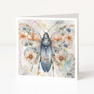 Greeting card with a colourful butterfly illustration on a floral background