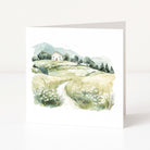 Greeting card with a scenic illustration of a house on a hillside.
