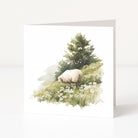 Greeting card with a sheep and tree design on a white background
