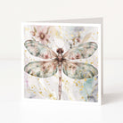 Greeting card with a dragonfly and floral design on a white background