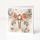 Greeting card with a butterfly design surrounded by flowers on a white background