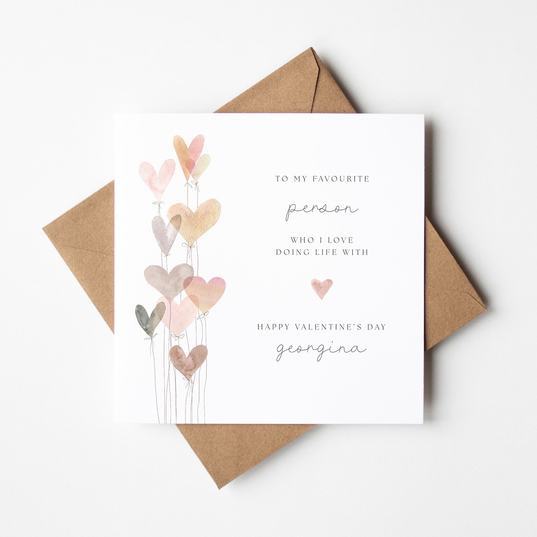Valentine's Day card with heart design and personalized message on a white background