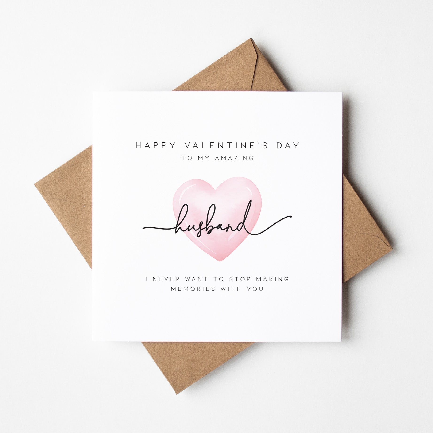 Valentine's Day card for an amazing husband with a pink heart and brown envelope on a white background
