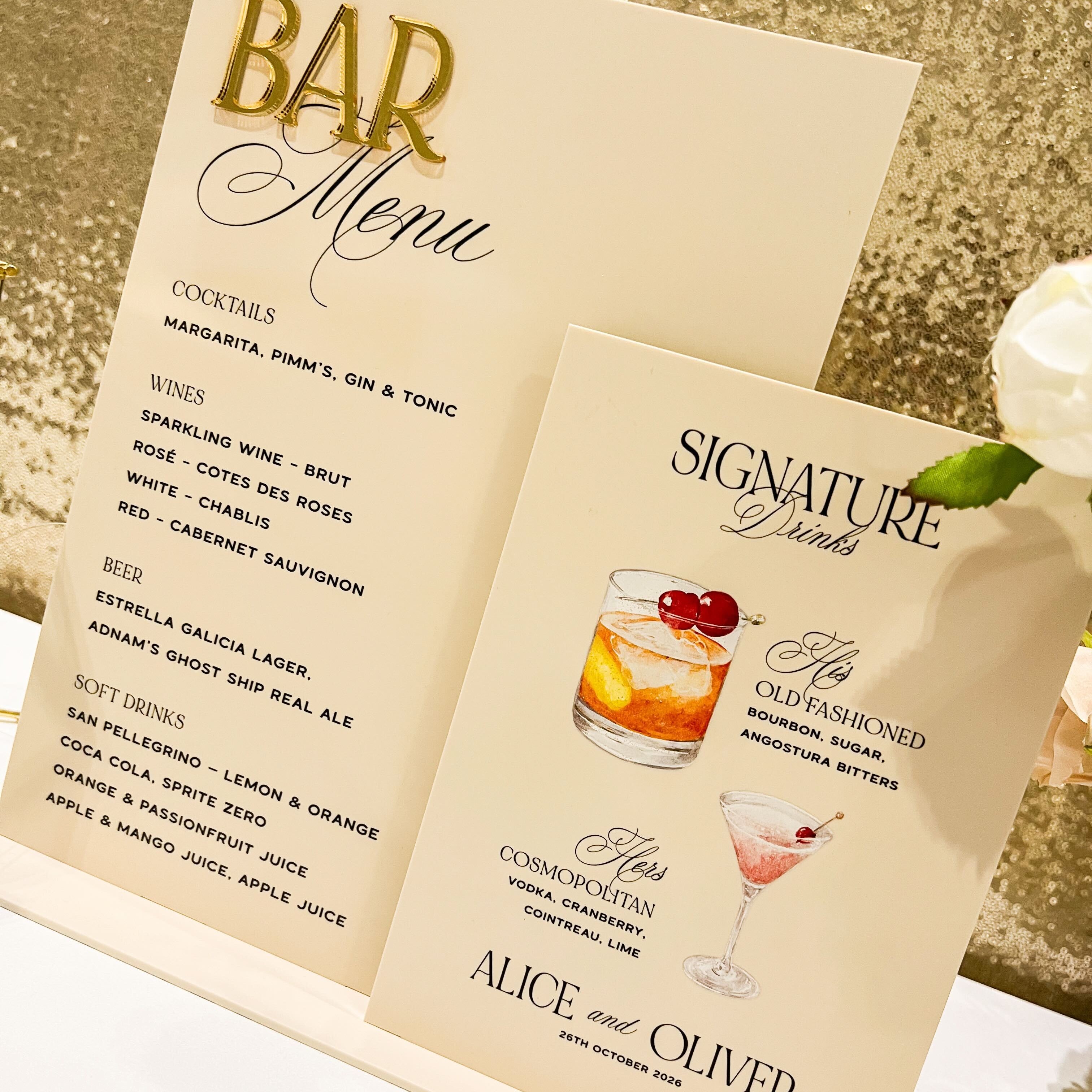 Bar menu with cocktail illustrations on a gold glittery background