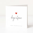 Valentine's Day card with a red heart and 'always & forever' text on a white background