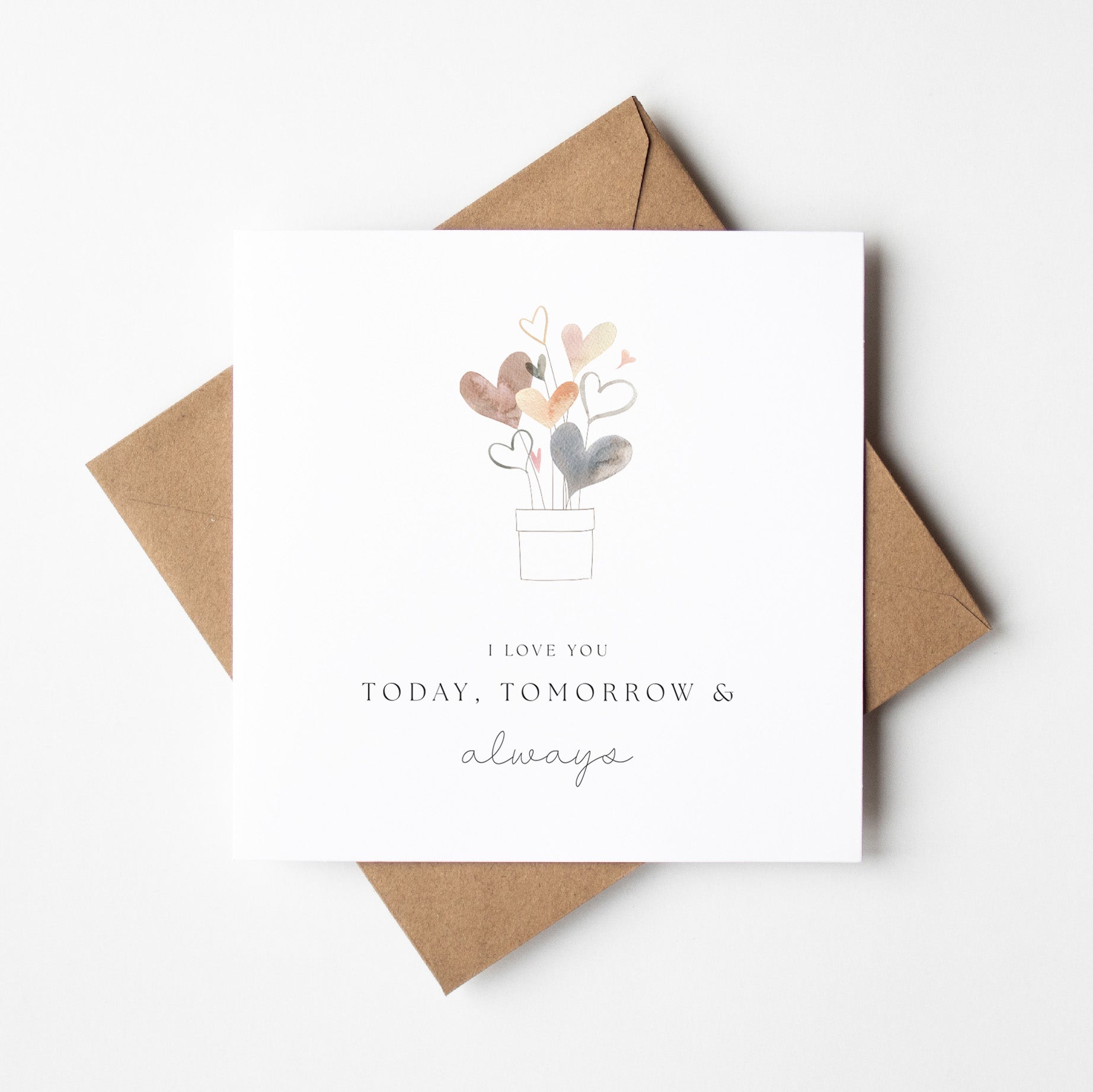 Greeting card with heart design and envelope on a white background