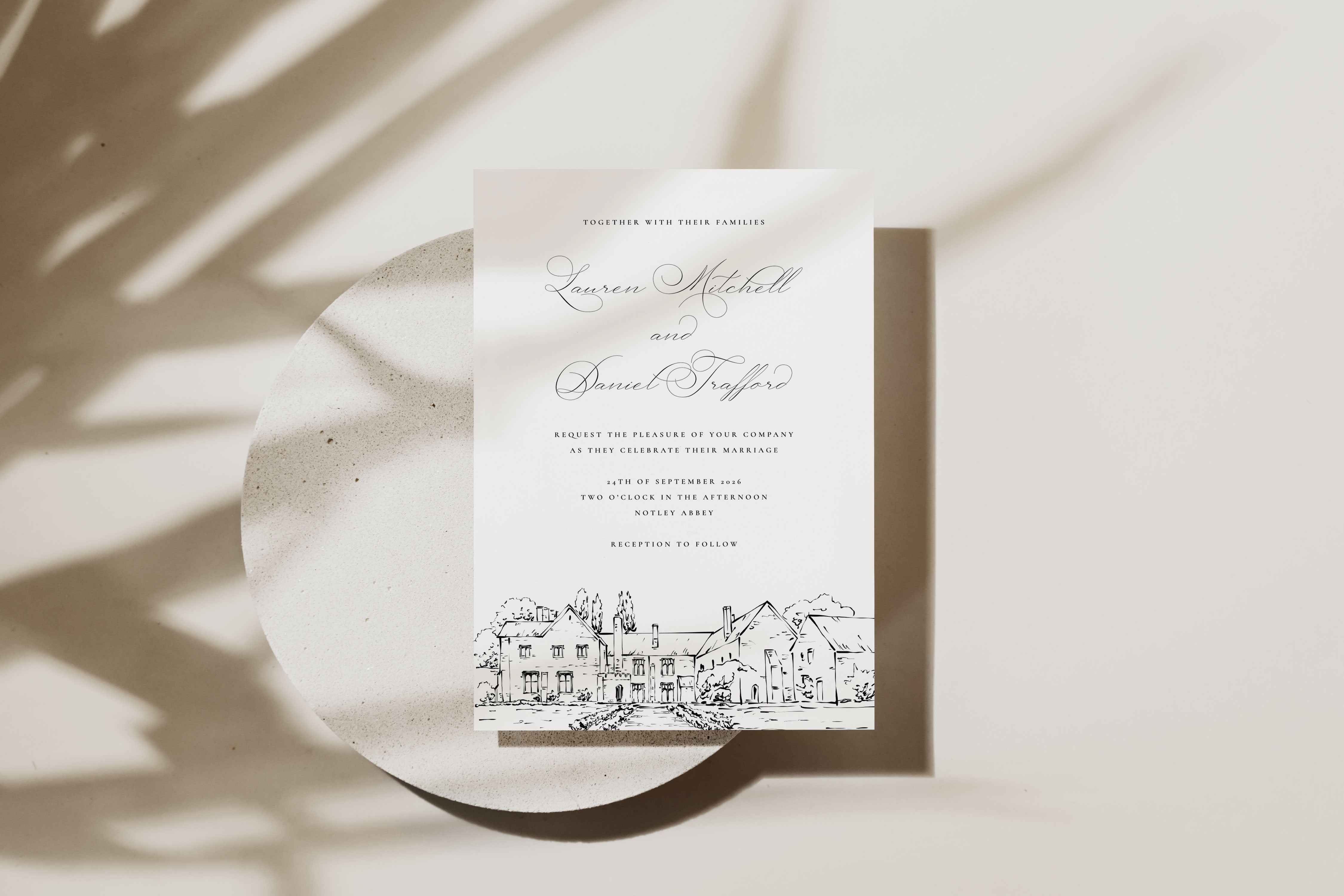 Wedding invitation card with black and white illustration of a house on a neutral background