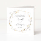 Wedding card with floral design and personalized text on a white background
