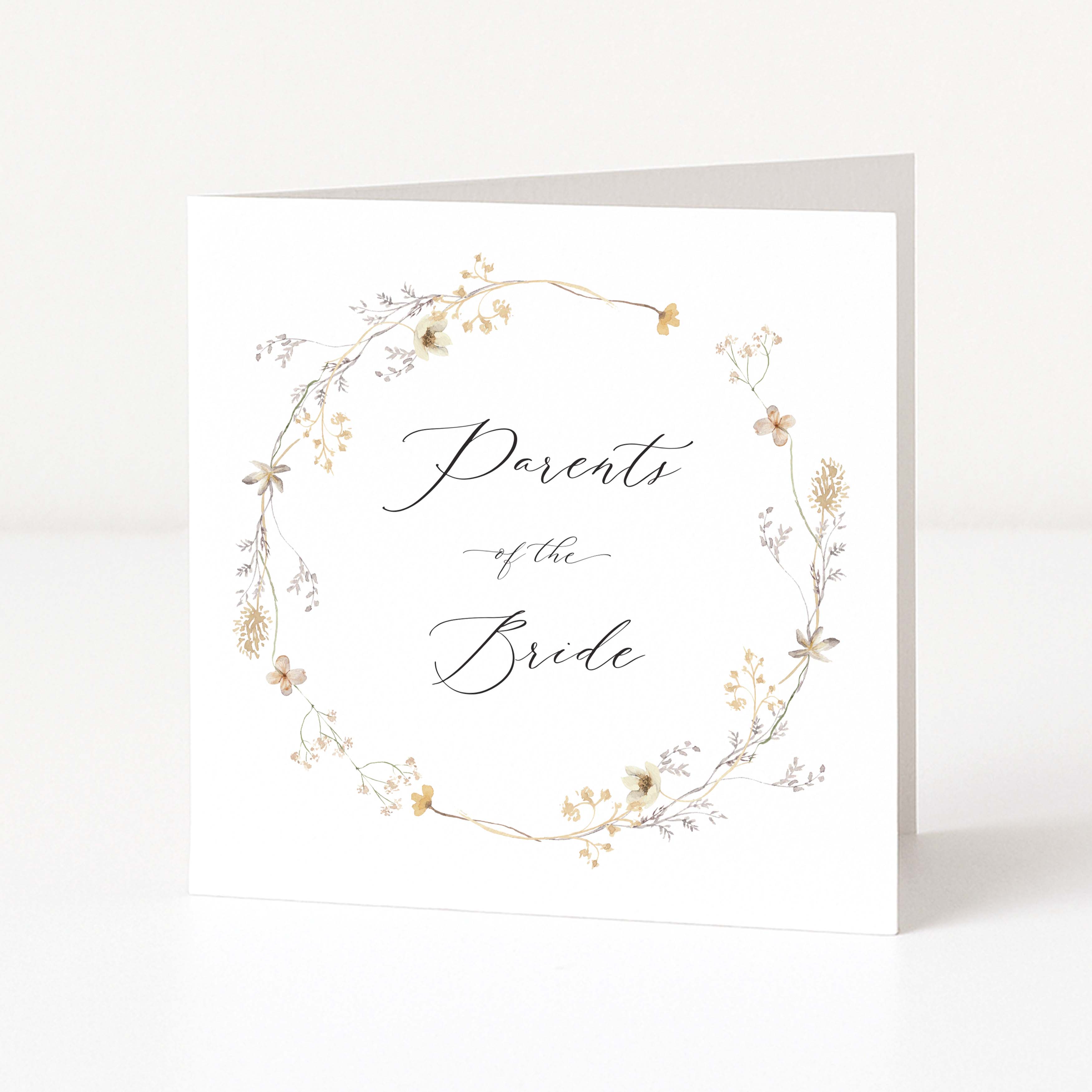 Greeting card with floral wreath and 'Parents of the Bride' text on a white background