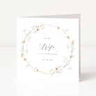 Greeting card with floral design and text 'To my Wife on our wedding day' on a white background