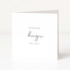 Greeting card with 'Sending hugs to you' text on a white background