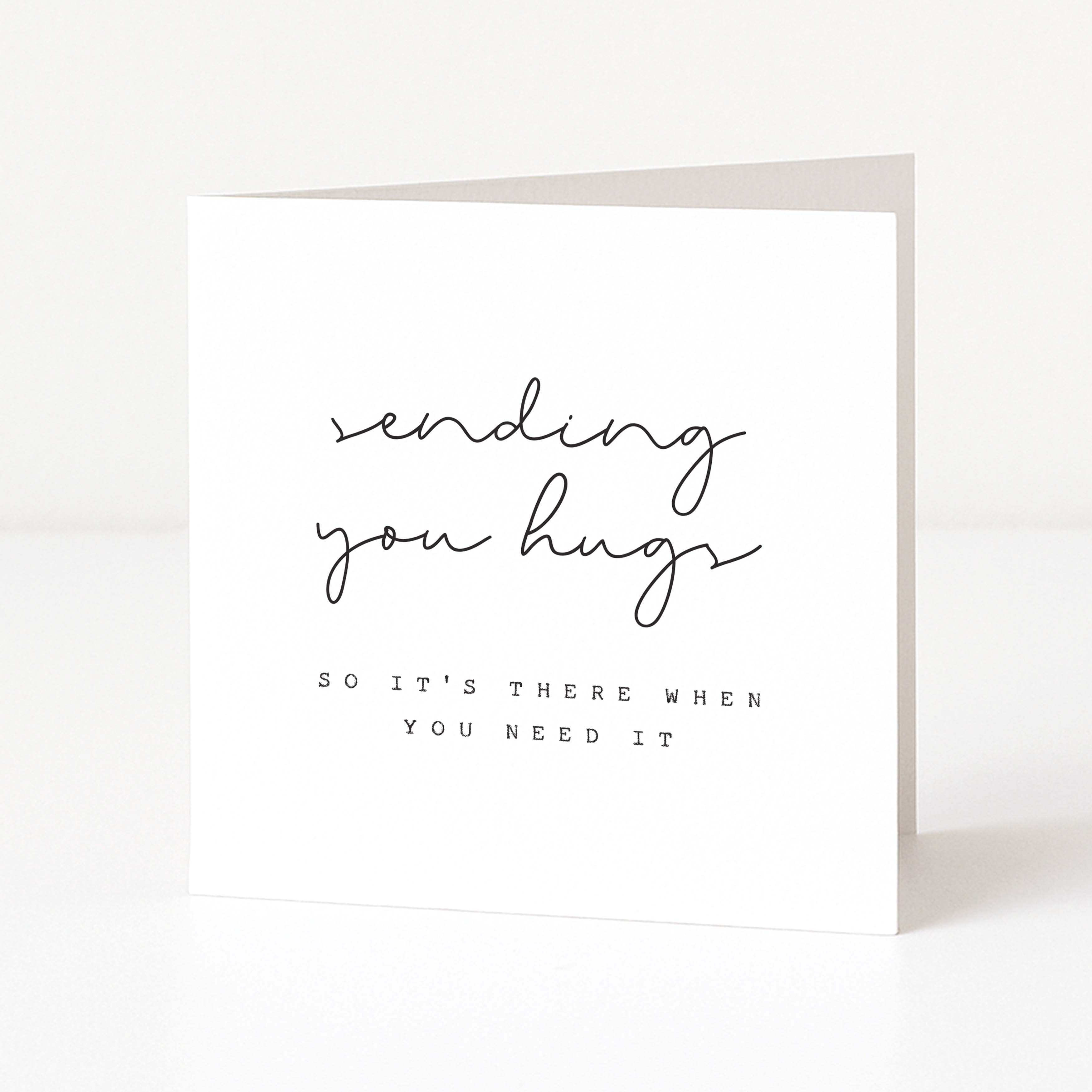 Greeting card with text 'sending you hugs so it's there when you need it' on a white background