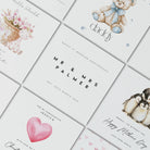 flat lay of multiple greetings cards with different sentiments on white card laid out diagonally