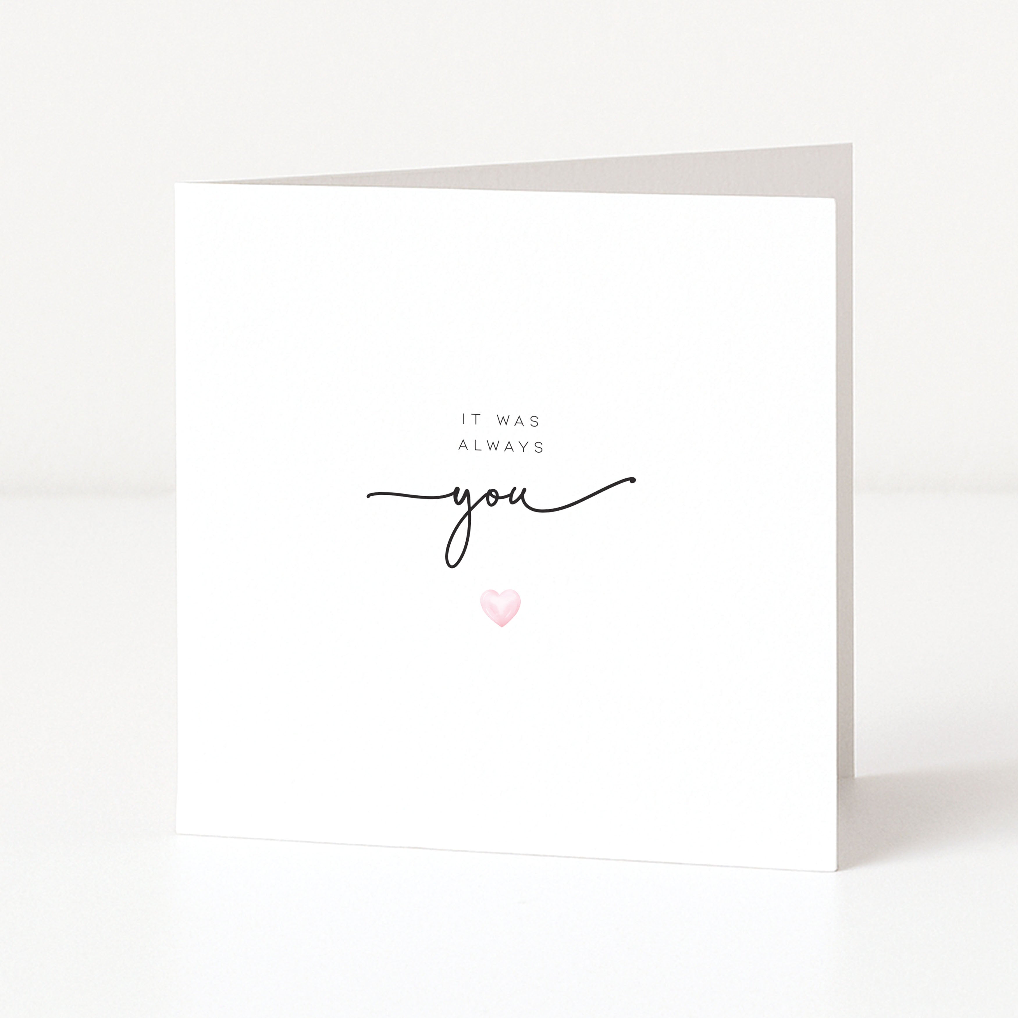 Greeting card with 'It was always you' text and a heart on a white background